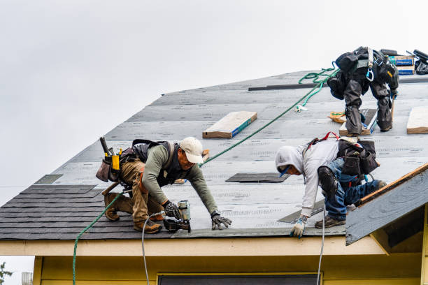 Professional Gutter Installation technician working in Shelton, CT